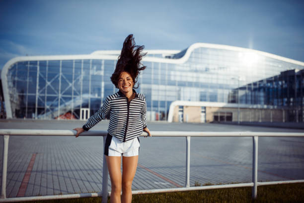 istock young carefree woman jumping 641715894