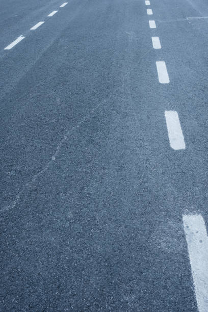 istock Asphalt Road with Traffic Lanes 641720456