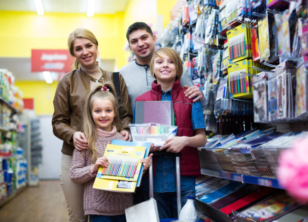 istock Family buying copy-books 641722706