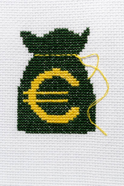 istock Money Bag embroidered on white cloth. 641722790