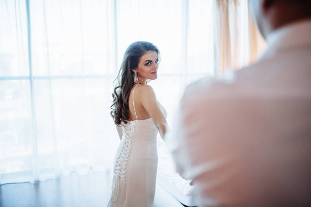 istock Wedding couple in hotel room 641724288