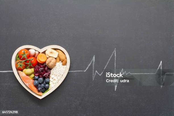 Healthy Food In Heart And Cardiograph On Blackboard Medical Abstract Stock Photo - Download Image Now