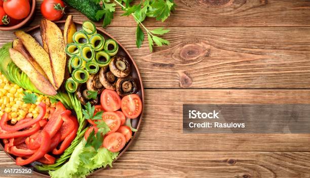 Buddha Bowl Of Mixed Vegetable On The Wooden Table Stock Photo - Download Image Now