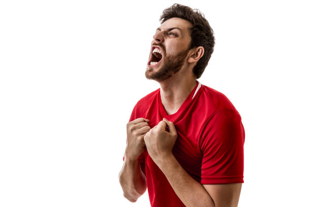 istock Fan / Sport Player on red uniform celebrating on white background 641727186