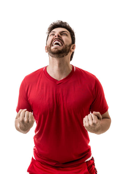 istock Fan / Sport Player on red uniform celebrating on white background 641727200