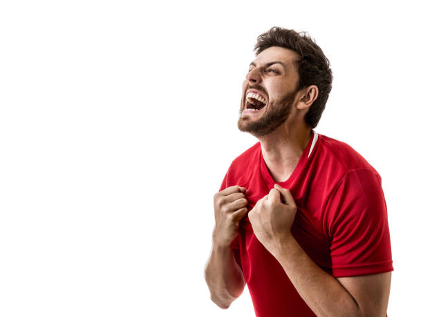 istock Fan / Sport Player on red uniform celebrating on white background 641727218