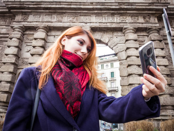 istock Business woman taking a Selfie in Milan 641729074