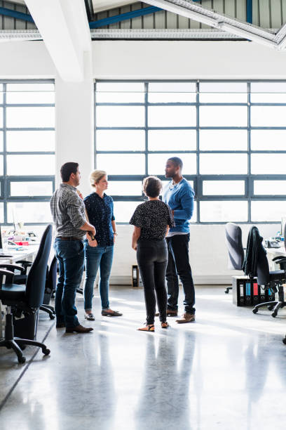 istock Business people communicating in creative office 641731698