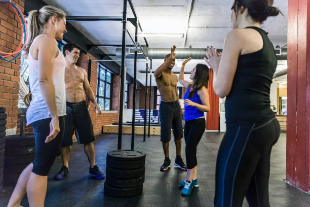 istock Happy athletes talking and enjoying in gym 641732188