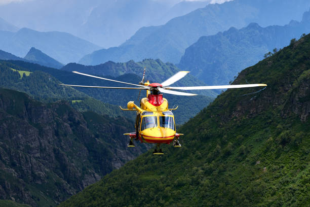 Alpine helicopter rescue stock photo