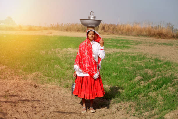 istock Women standing in the field portrait 641736154