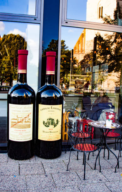 Wine bottles in an ice bucket on the restaurant table, red wine