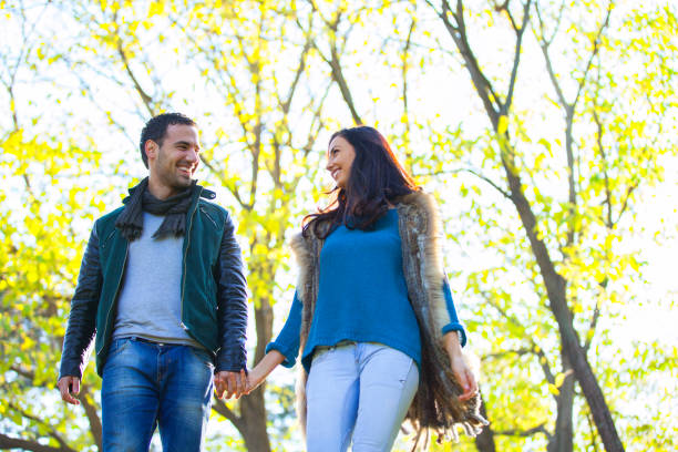 istock Happy young couple at the park 641740074