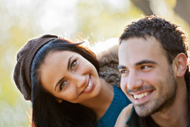 istock Happy young couple at the park 641740142