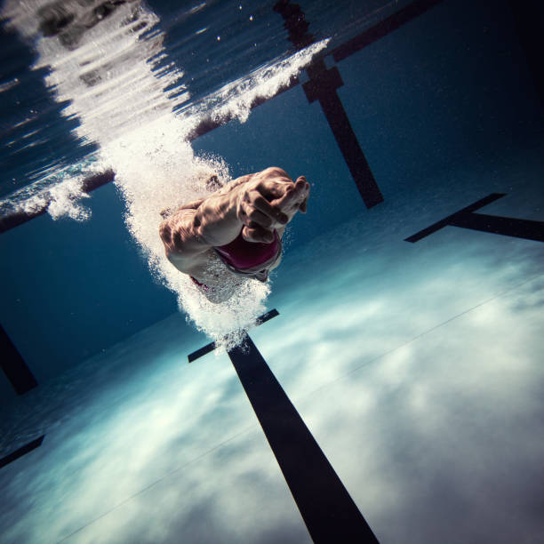 istock Athlete jumping int the water 641742298