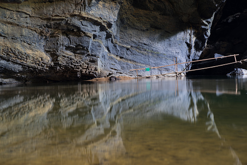 Tranquil rock and it's reflecting on water in Son Doong Cave, the largest cave in the world, is in the heart of the Phong Nha Ke Bang National Park in the Quang Binh province