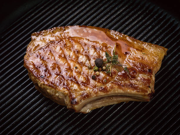 istock Roasted pork steak on ribs. 641752808