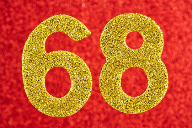 istock Number sixty-eight yellow color over a red background. Anniversary. Horizontal 641754930