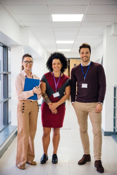istock Teachers In The Hallway 641755216