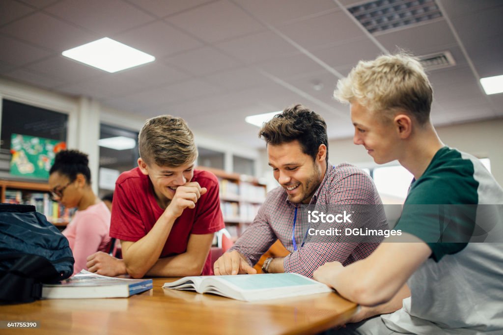 Recevant de l’aide en cours - Photo de Enseignant libre de droits