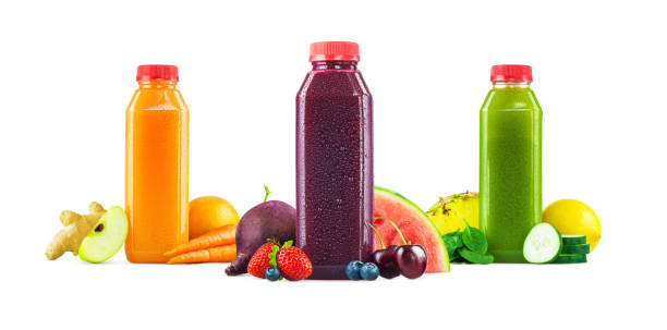 istock Freshly Squeezed Fruit and Vegetable Juice Bottles on White Background 641756930