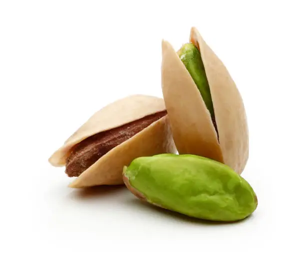 Pistachio nuts isolated on white background
