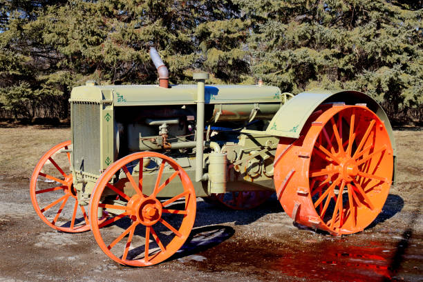 istock old tractor with metal wheels 641759678