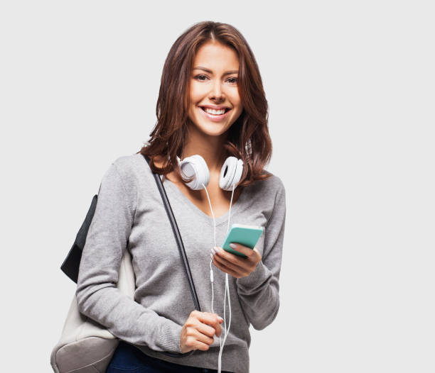 istock Happy young student girl using smart phone 641762308