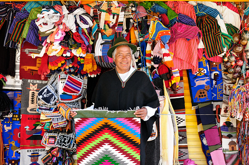 Colorful fabrics for sale at a local market in the old town of Antigua, Guatemala.