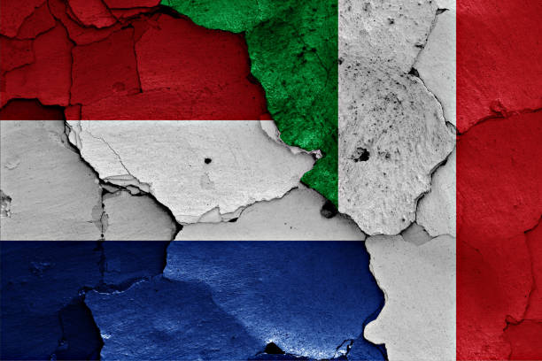istock flags of Netherlands and Italy  painted on cracked wall 641769668