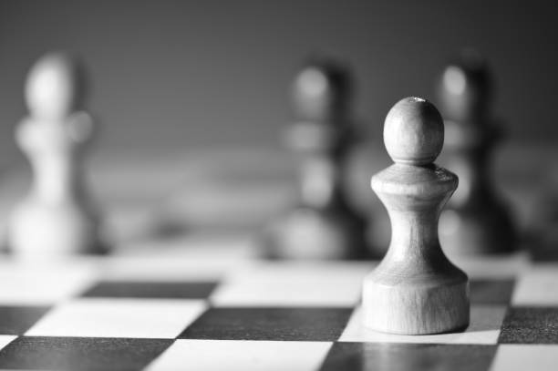 istock Chess on a chess board in black and white 641772922