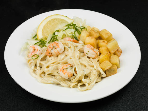 istock Prawn Alfredo Linguine Italian Style Pasta Dish 641774090