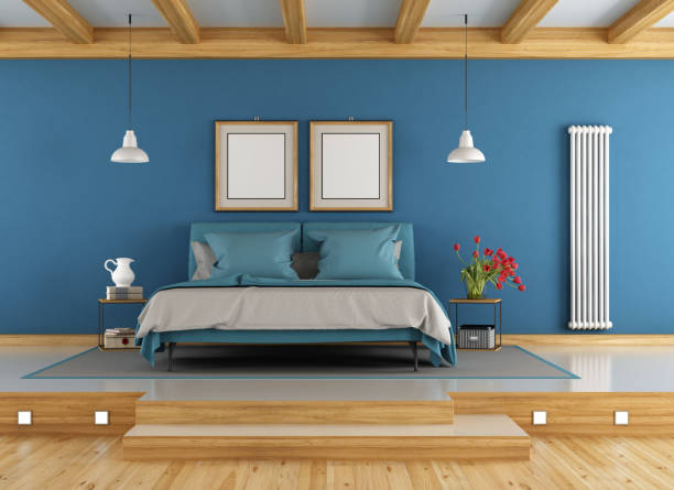 istock Blue and wooden master bedroom 641779460