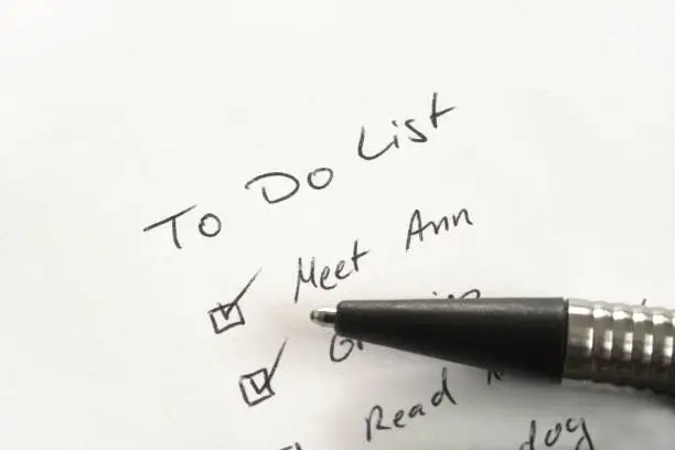 Handwritten To-Do List Typography on white paper, longhand