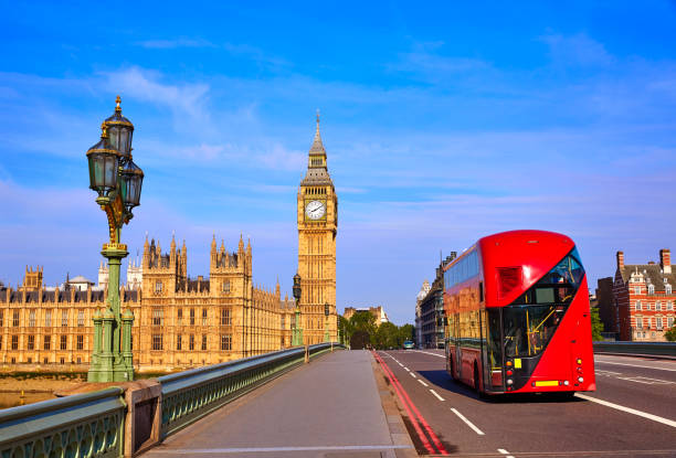 istock Big Ben Clock Tower and London Bus 641784026