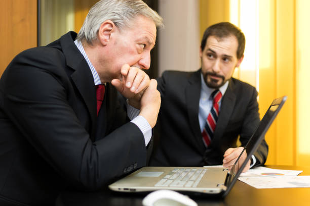 istock Businessmen working in the office 641789336