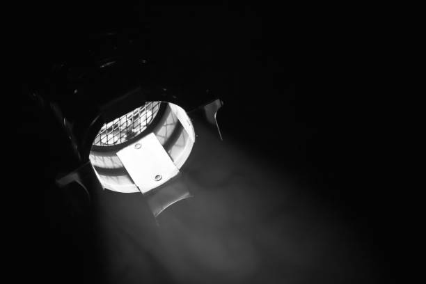 istock Classical spot light in metal body over black 641794292