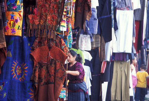 people in traditional clotes at the Market in the Village of  Chichi or Chichicastenango in Guatemala in central America.