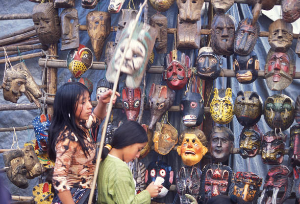 people in traditional clotes at the Market in the Village of  Chichi or Chichicastenango in Guatemala in central America.