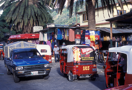 trafic at  a Market in the old city in the town of Antigua in Guatemala in central America.
