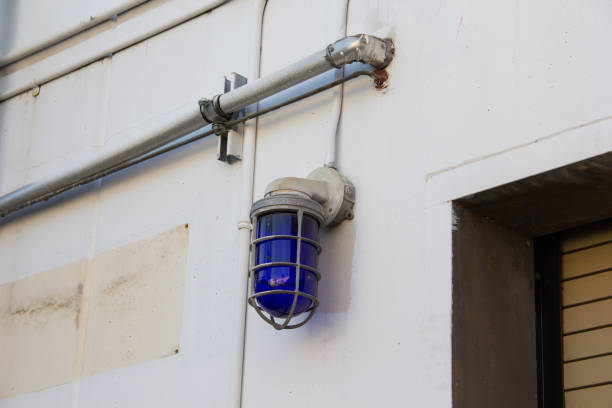istock Industrial Light on Side of Building 641795924