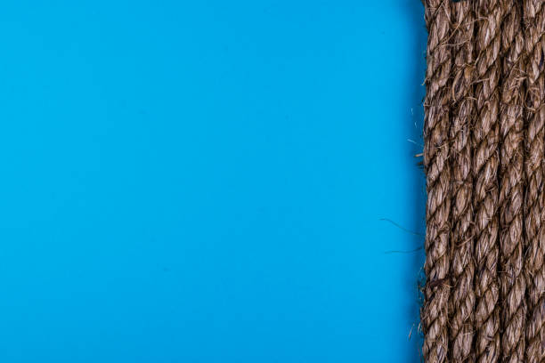 istock old natural rope texture on blue background 641797054