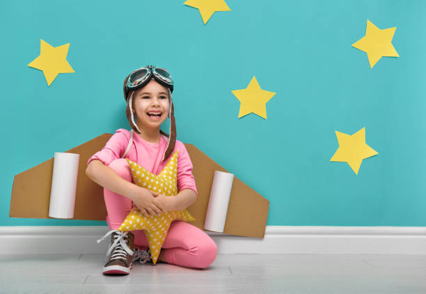 istock girl in an astronaut costume 641798142