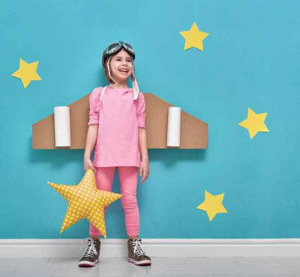 istock girl in an astronaut costume 641798150