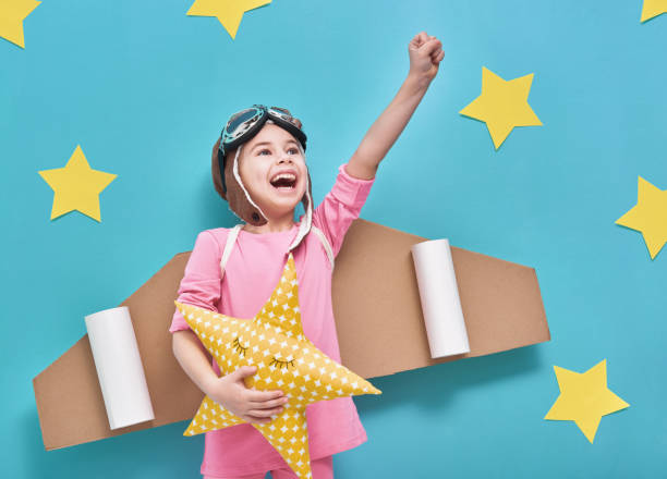 istock girl in an astronaut costume 641798156