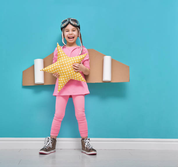 istock girl in an astronaut costume 641798168