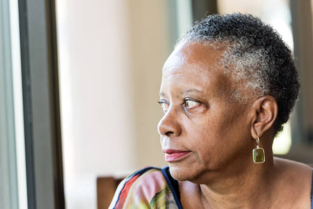 istock Sad senior african american woman 641801764