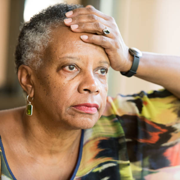 istock Sad senior african american woman 641801952