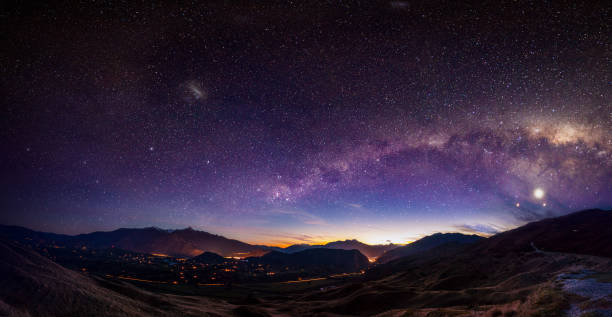 Milky Way Scenic view of Queenstown, New Zealand with Milky Way milky way photos stock pictures, royalty-free photos & images