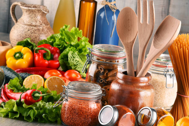istock Composition with assorted food products and kitchen utensils 641803214